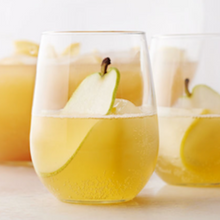 Load image into Gallery viewer, Dark Forest Sparkling Kombucha Original in a glass garnished with a slice of pear
